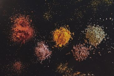Small piles of deferent spices