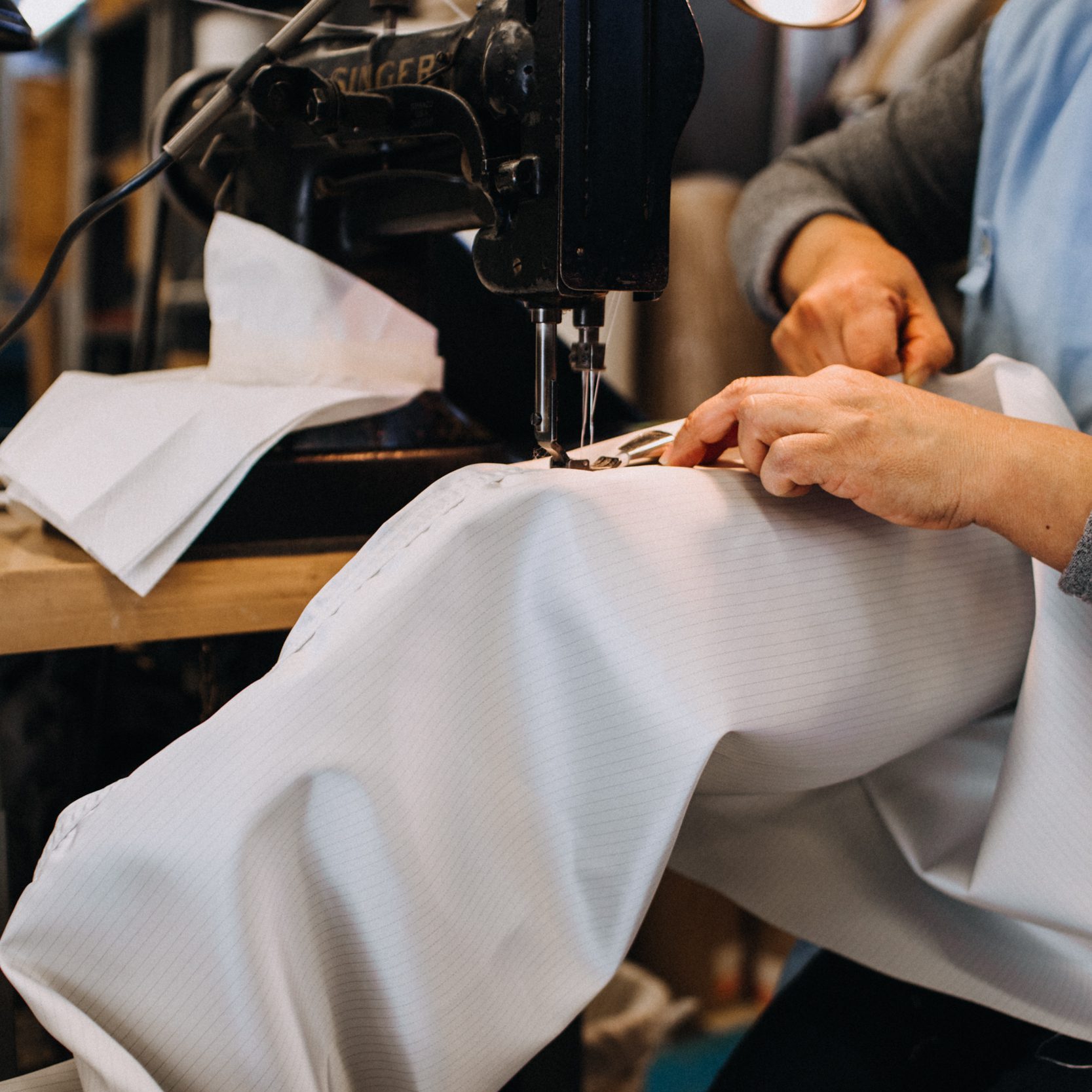 WEBssFilters__212 Person using sewing machine